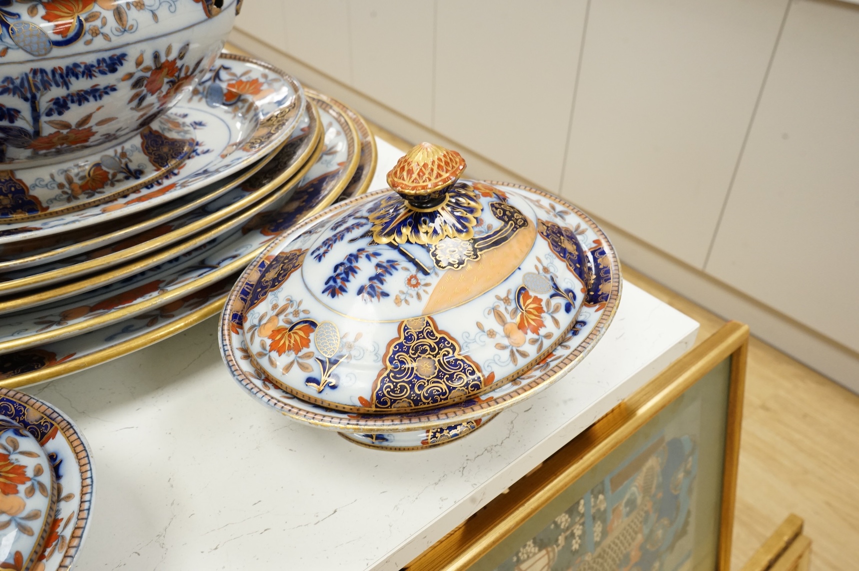 A Victorian Davenport dinner service to include tureens, dinner plates and soup bowls, largest 52cm wide